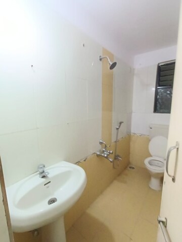 Bathroom in 3 BHK Apartment at Siddhivinayak Shubhashree Residential, Akurdi – for Rent