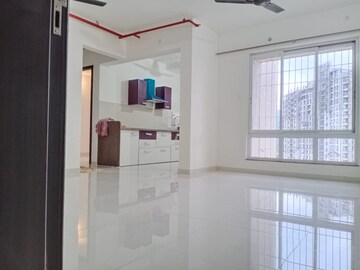 Kitchen in 2 BHK Apartment at Puranik Rumah Bali, Ghodbunder Road – for Sale