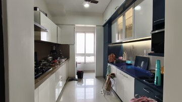 Kitchen in 3 BHK Apartment at Puranik Rumah Bali, Ghodbunder Road – for Sale
