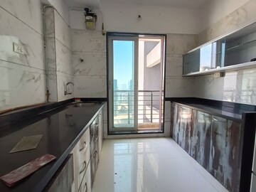 Kitchen in 3 BHK Apartment at Kabra Hyde Park, Manpada – for Rent
