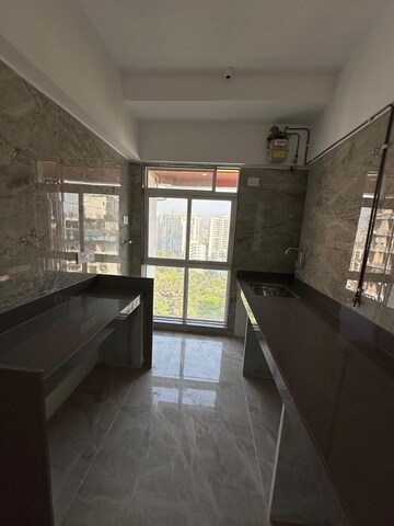 Kitchen in 1 BHK Apartment at BP DPS Park View, Goregaon West – for Sale