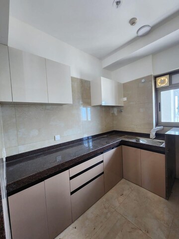 Kitchen in 2 BHK Apartment at Chandak Cornerstone, Worli – for Rent