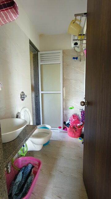 Bathroom in 1 BHK Apartment at Metropolis Aquaris Phase 1, Kasarvadavali – for Sale