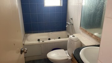 Bathroom in 2 BHK Apartment at Golden Palm Enclave, Hennur Road – for Rent