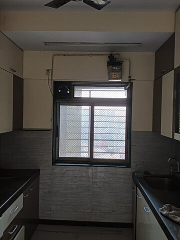 Kitchen in 2 BHK Apartment at Acme Ozone, Manpada – for Rent