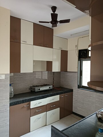 Kitchen in 2 BHK Apartment at Acme Ozone, Manpada – for Rent