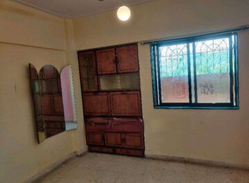 Bedroom in 2 BHK Apartment at Crystal Garden Estate CHS, Manpada – for Rent