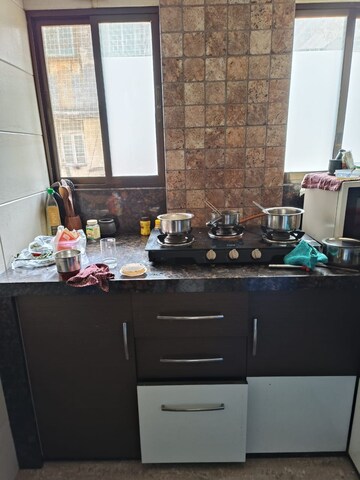 Kitchen in 1 BHK Apartment at Rakhangi Mahal, Worli – for Rent