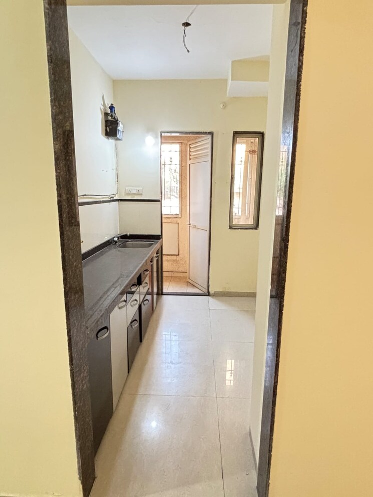 Kitchen, siddhi-highland-gardens 2 Bedroom 700 Sq.Ft. Apartment In Dhokali Thane 8313867