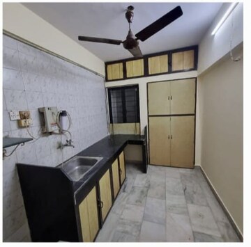 Kitchen in 2 BHK Apartment at Ganesh Krupa Vasant Vihar, Vasant Vihar – for Sale