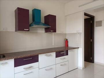 Kitchen in 1 BHK Apartment at Puranik Rumah Bali, Ghodbunder Road – for Rent