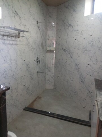 Bathroom in 5 BHK Builder Floor at Dalanwala – for Sale