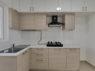 Kitchen in 2 BHK Apartment at Bhartiya Nikoo Homes Phase 2, Thanisandra Main Road – for Sale