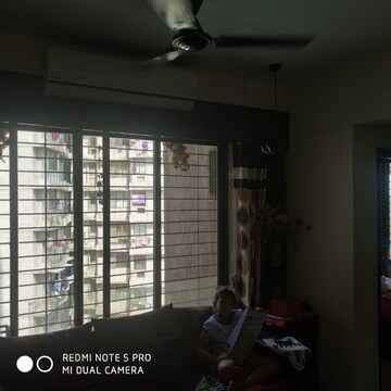 Living Room in 1 BHK Apartment at Raunak Heights, Ghodbunder Road – for Rent