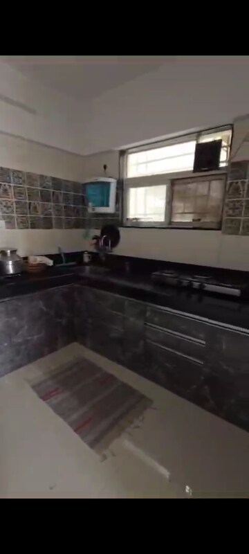 Kitchen in 1 BHK Apartment at Vijayalaxmi Laxmisatyam Residency, Dhanori – for Sale