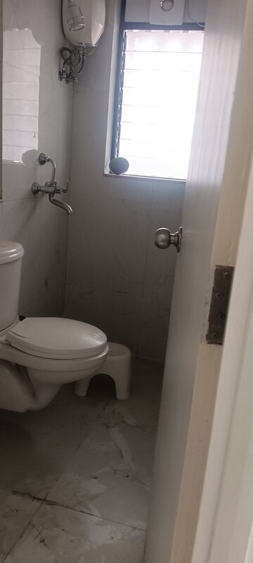 Bathroom in 1 BHK Apartment at Runwal Gardens, Dombivli East – for Sale