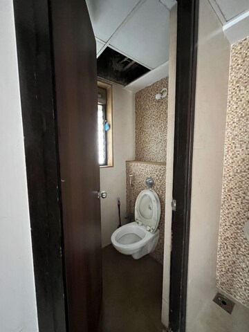 Bathroom in 1 BHK Apartment at Lodha Palava City Lakeshore Greens, Dombivli East – for Rent