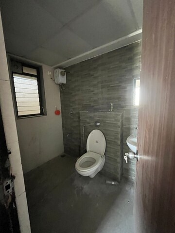 Bathroom in 1.5 BHK Apartment at Lodha Palava City Lakeshore Greens, Dombivli East – for Rent