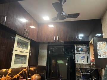 Kitchen in 1 RK Apartment at Haware Vrindavan B, New Panvel – for Rent