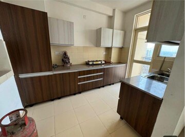 Kitchen in 3 BHK Apartment at Sushma Elite Cross, Dhakoli Village – for Sale