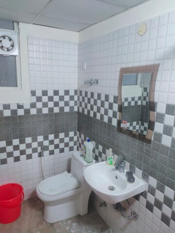 Bathroom in 2 BHK Apartment at Aman Vihar – for Rent