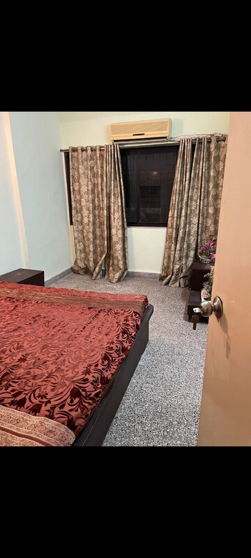 Bedroom in 2 BHK Apartment at Yashovardhan Society, Mahim – for Rent