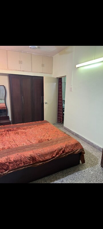 Bedroom in 2 BHK Apartment at Yashovardhan Society, Mahim – for Rent