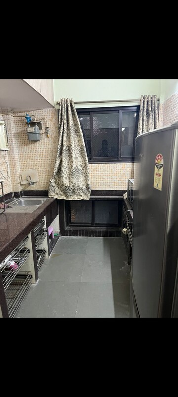 Kitchen in 2 BHK Apartment at Yashovardhan Society, Mahim – for Rent
