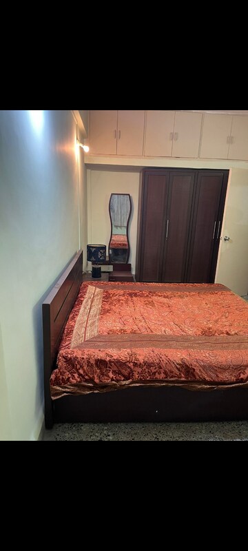 Bedroom in 2 BHK Apartment at Yashovardhan Society, Mahim – for Rent