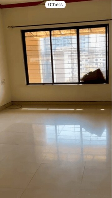 Room in 2 BHK Apartment at Rutu Estate, Brahmand – for Sale