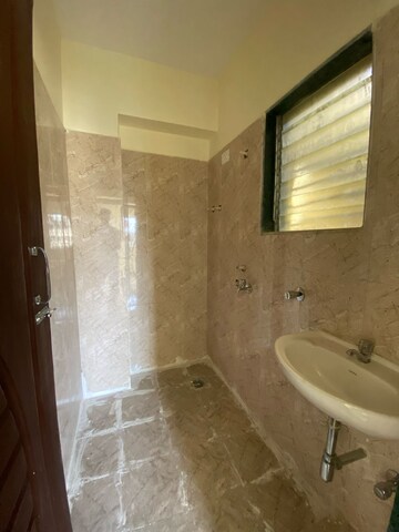 Bathroom in 1 BHK Apartment at Lodha Golden Dream, Dombivli East – for Rent