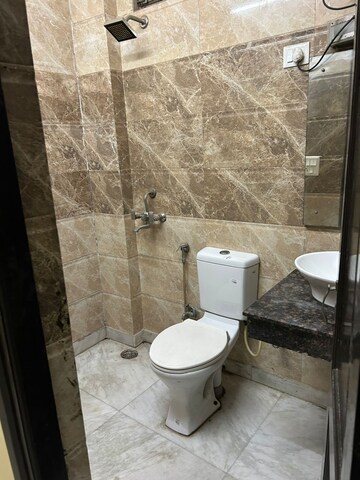 Bathroom in 3 BHK Builder Floor at Ansal Plaza Sector-23, Sector 23 – for Rent