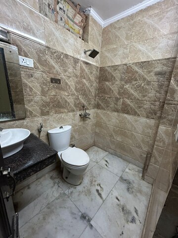 Bathroom in 3 BHK Builder Floor at Ansal Plaza Sector-23, Sector 23 – for Rent