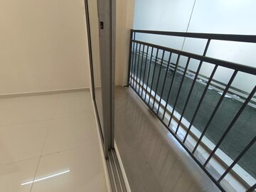 Balcony in 1 BHK Apartment at Rustomjee Global City – for Sale