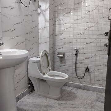 Bathroom in 2 BHK Apartment at Palm Residency Chhatarpur, Rajpur Khurd Extension – for Rent