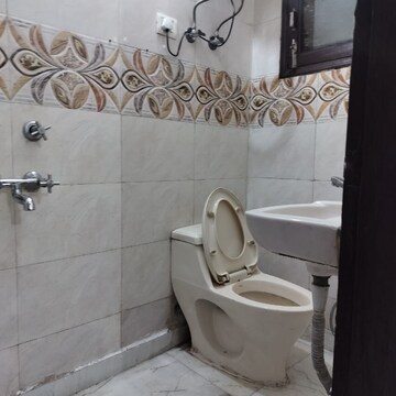 Bathroom in 2 BHK Apartment at Palm Residency Chhatarpur, Rajpur Khurd Extension – for Rent