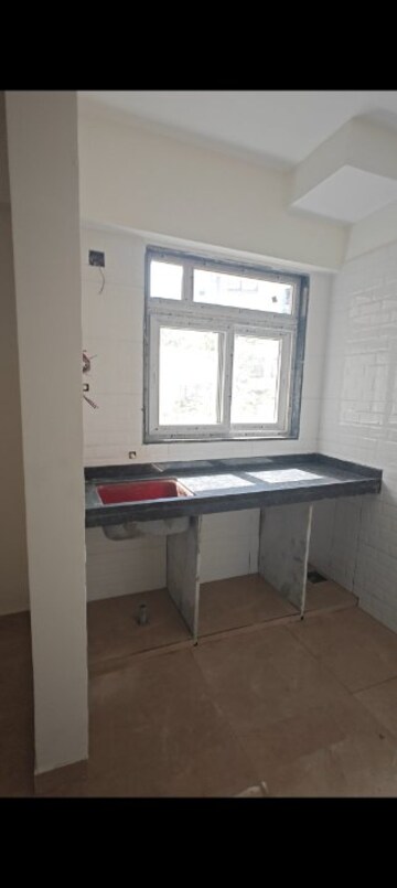 Kitchen in 1 BHK Apartment at Parijat Building, Andheri West – for Sale
