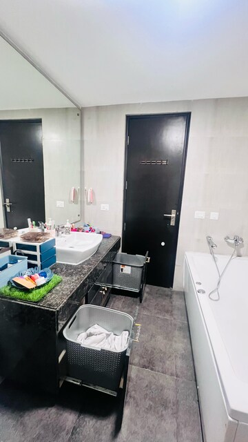 Bathroom in 3 BHK Apartment at Microtek Greenburg, Sector 86 – for Rent