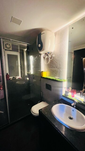 Bathroom in 3 BHK Apartment at Microtek Greenburg, Sector 86 – for Rent