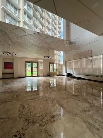 Building Lobby in 2 BHK Apartment at Pride Park Royale, Andheri East – for Rent