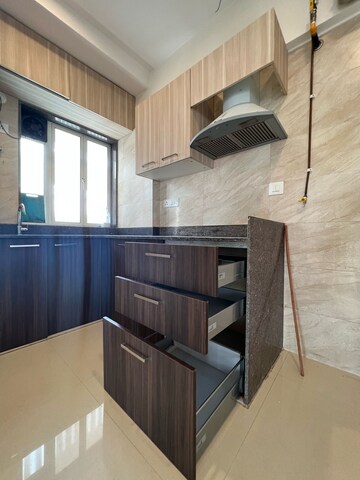 Kitchen in 2 BHK Apartment at Pride Park Royale, Andheri East – for Rent