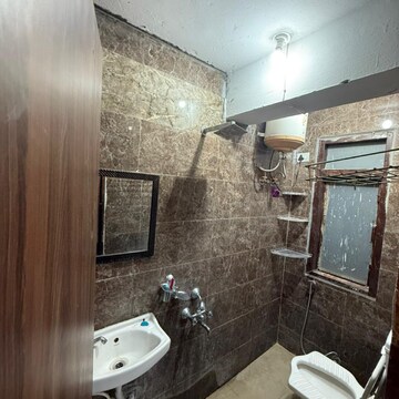 Bathroom in 1 RK Apartment at Emaar Emerald Floors Premier, Sector 65 – for Rent