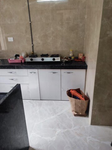 Kitchen in 2 BHK Apartment at Nakul Raj , Malad West – for Rent