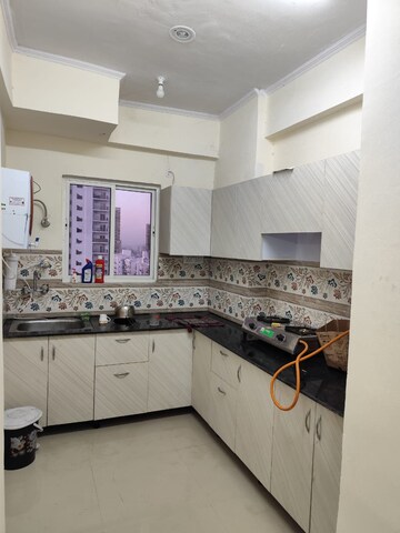 Kitchen in 2 BHK Apartment at Aims Golf City, Sector 75 – for Rent