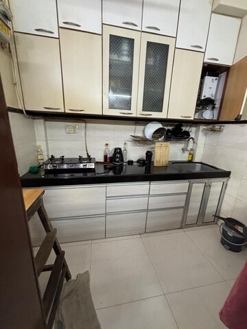 Kitchen in 2 BHK Apartment at Kanakia Rainforest, Andheri East – for Rent
