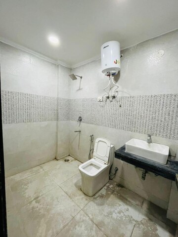 Bathroom in 2 BHK Builder Floor at Freedom Fighters Enclave – for Rent