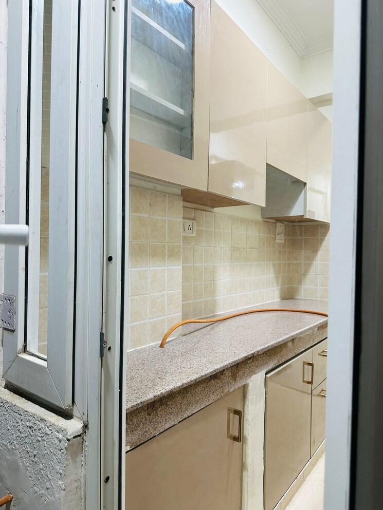 Kitchen, ac-tower 2 Bedroom 1200 Sq.Ft. Apartment In Sector 84 Gurgaon 8316258