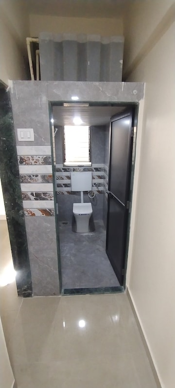 Kitchen in 1 BHK Apartment at Shree Sadguru CHS, Kalwa – for Sale