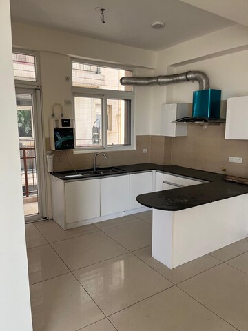 Kitchen in 4 BHK Apartment at Barnala Green Lotus Avenue, Ambala Highway – for Rent