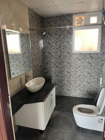 Bathroom in 4 BHK Apartment at Barnala Green Lotus Avenue, Ambala Highway – for Rent